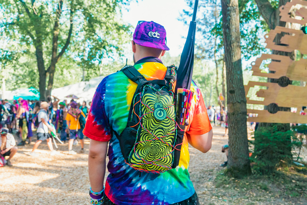 Festival-goer with custom interchangeable skin on Lunchbox pack